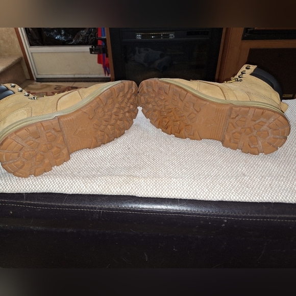 A pair of Herman Survivors leather boots in a men's size 11.5 Wide. Safety Toe. - Picture 12 of 12